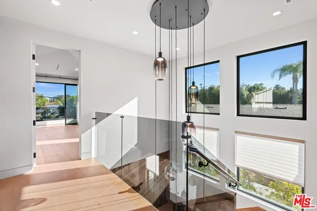 a view of an empty room with a fireplace