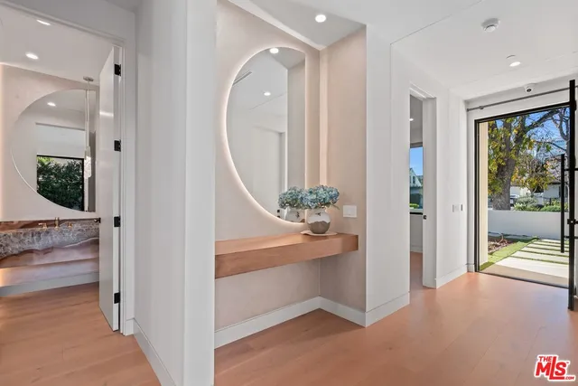 a view of a lobby with furniture and floor to ceiling window