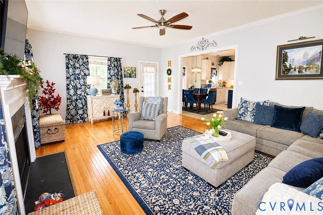 13818 Hawkins Park Road Midlothian, VA 23114 - Photo 11 of 28 Living room featuring wood-finish flooring, a fire