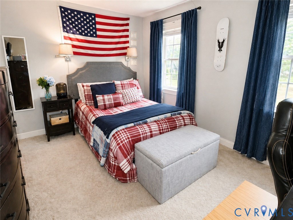 13818 Hawkins Park Road Midlothian, VA 23114 - Photo 18 of 28 Carpeted bedroom featuring an upholstered headboar