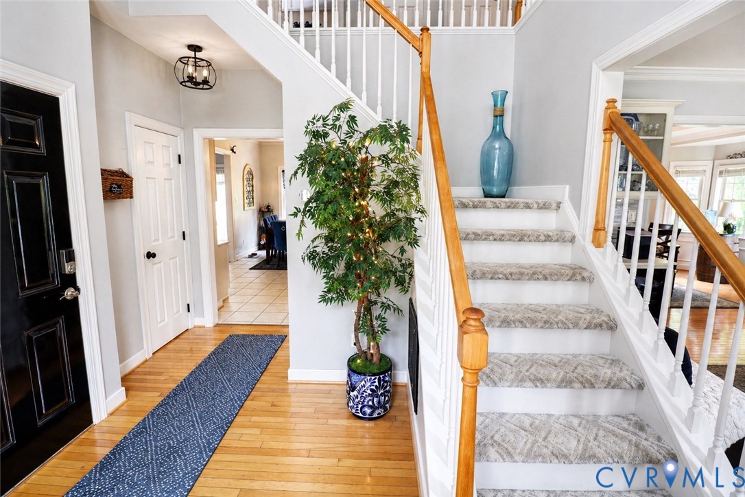 13818 Hawkins Park Road Midlothian, VA 23114 - Photo 2 of 28 Foyer featuring hardwood flooring, a staircase wit