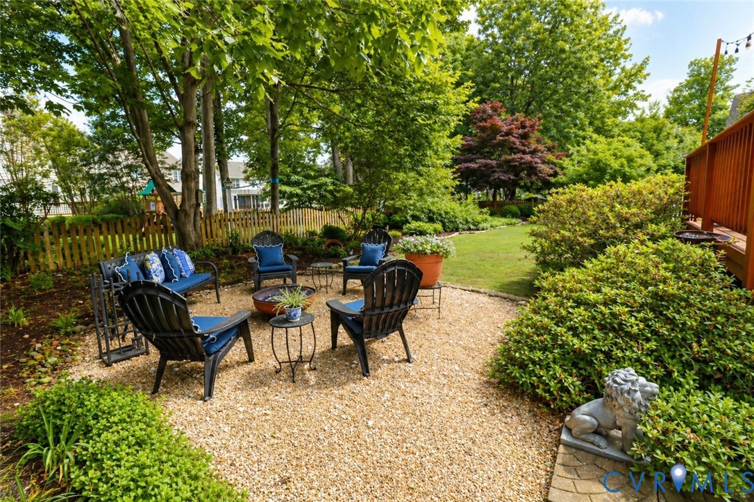 13818 Hawkins Park Road Midlothian, VA 23114 - Photo 25 of 28 Gravel patio area featuring a fire pit