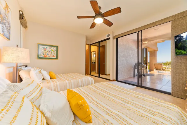 a bedroom with a bed and a walk in closet