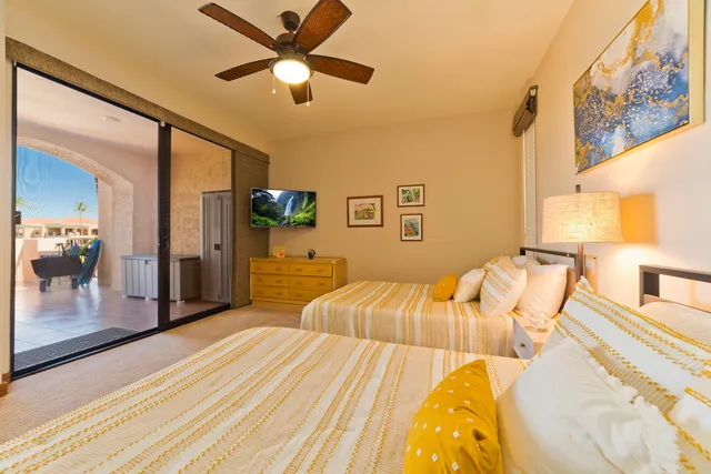a bathroom with a double vanity sink and mirror
