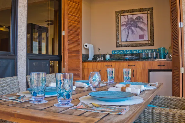 an aerial view of a house a swimming pool and outdoor space