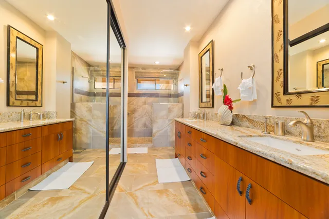 a bathroom with a bathtub and shower
