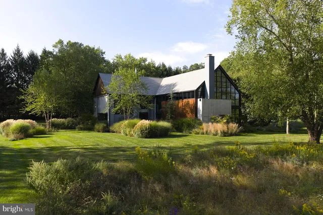 a outdoor living space with furniture and garden view