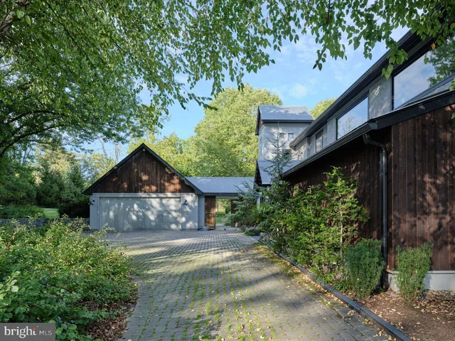 a view of a chairs and tables in the garden