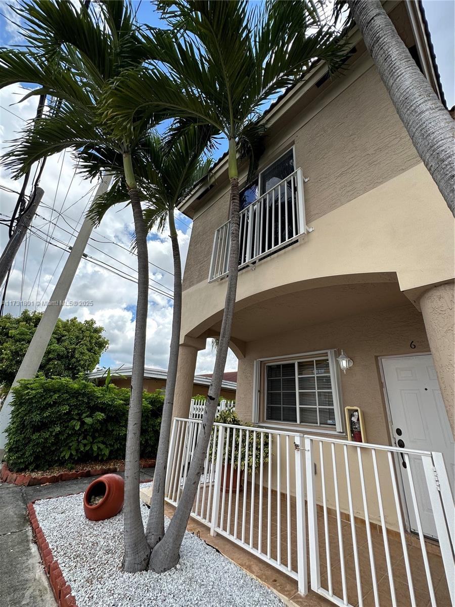 425 East 3rd Avenue, Unit 6 Hialeah, FL 33010 - Photo 1 of 24 a view of a house with backyard and sitting area