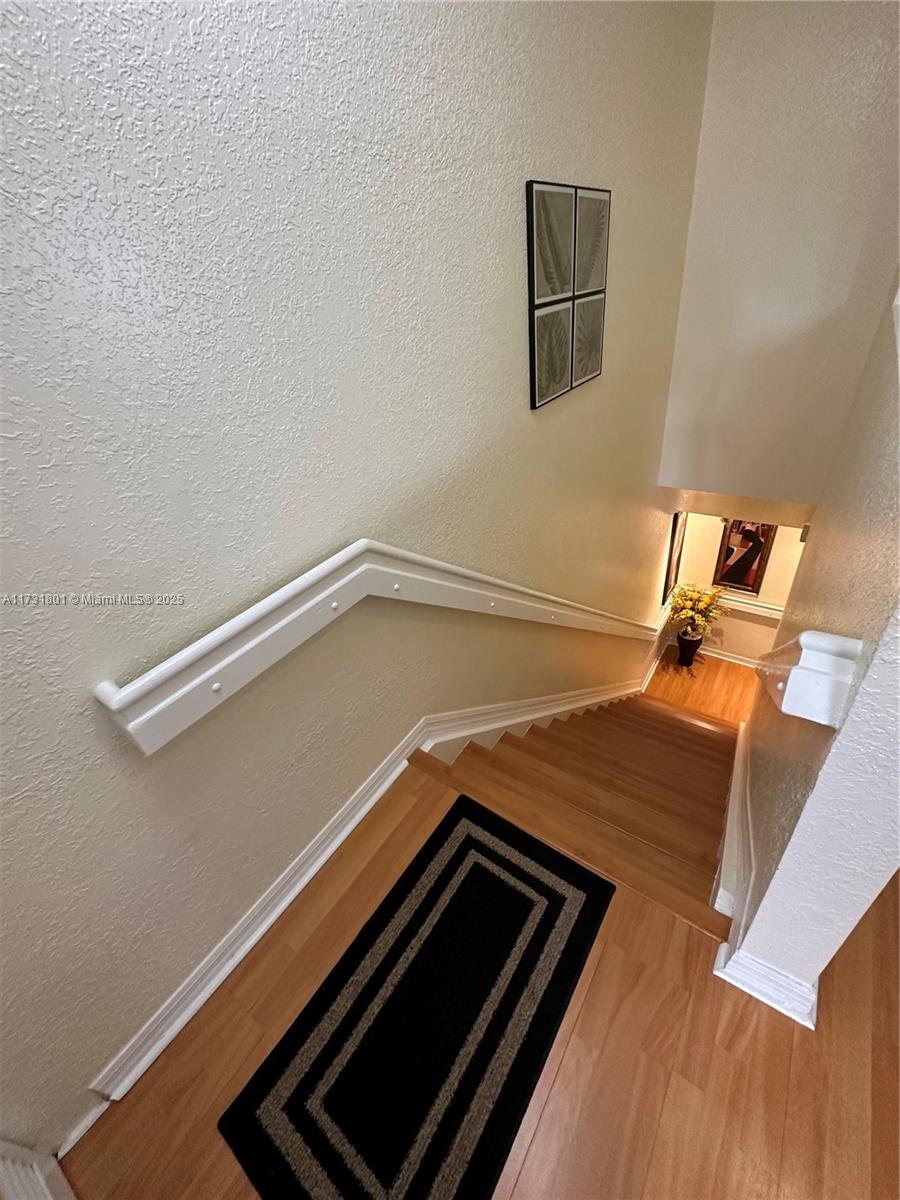 425 East 3rd Avenue, Unit 6 Hialeah, FL 33010 - Photo 12 of 24 a black and white photo of a room