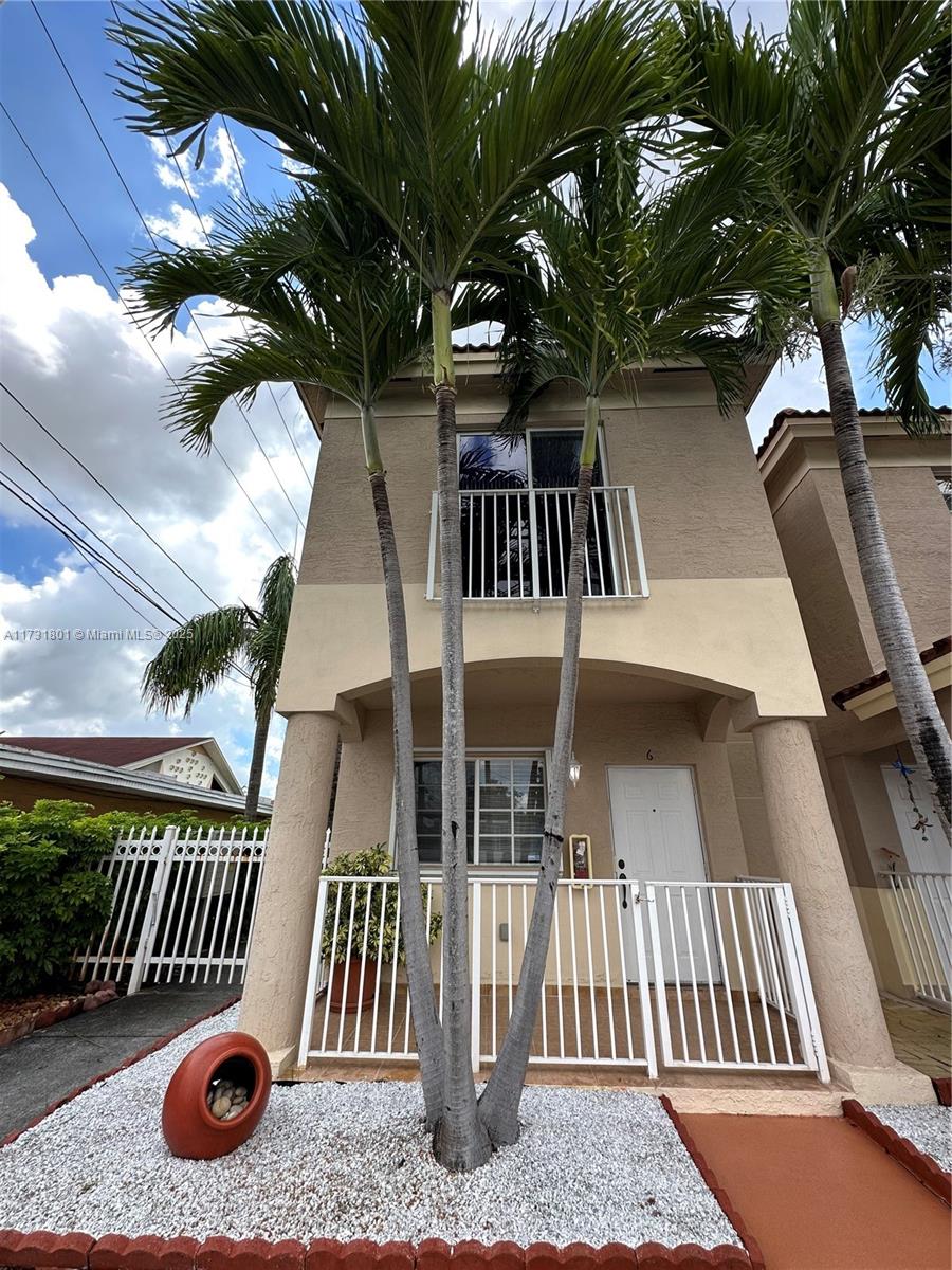 425 East 3rd Avenue, Unit 6 Hialeah, FL 33010 - Photo 3 of 24 a view of entryway with a yard