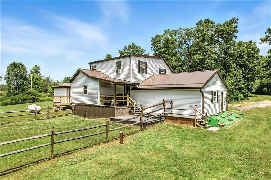 440 Kinsman Road Greenville, PA 16125 - Photo 5 of 50 fenced in area leads to trex deck and mudroom