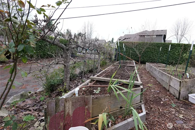 a view of a wooden fence