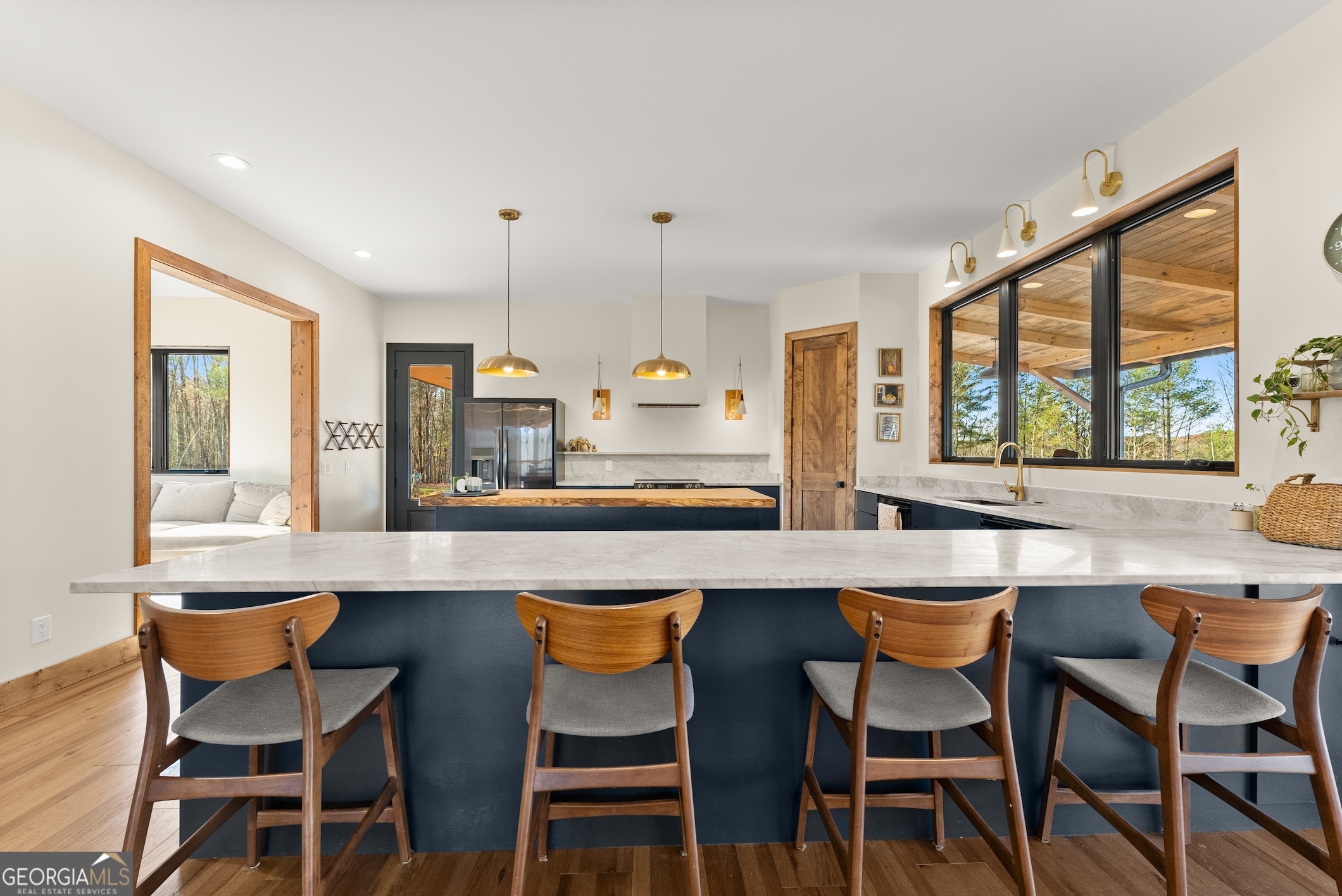 147 Jess Hunt W 60 Acres Road Cleveland, GA 30528 - Photo 15 of 69 a kitchen with a table and chairs in it