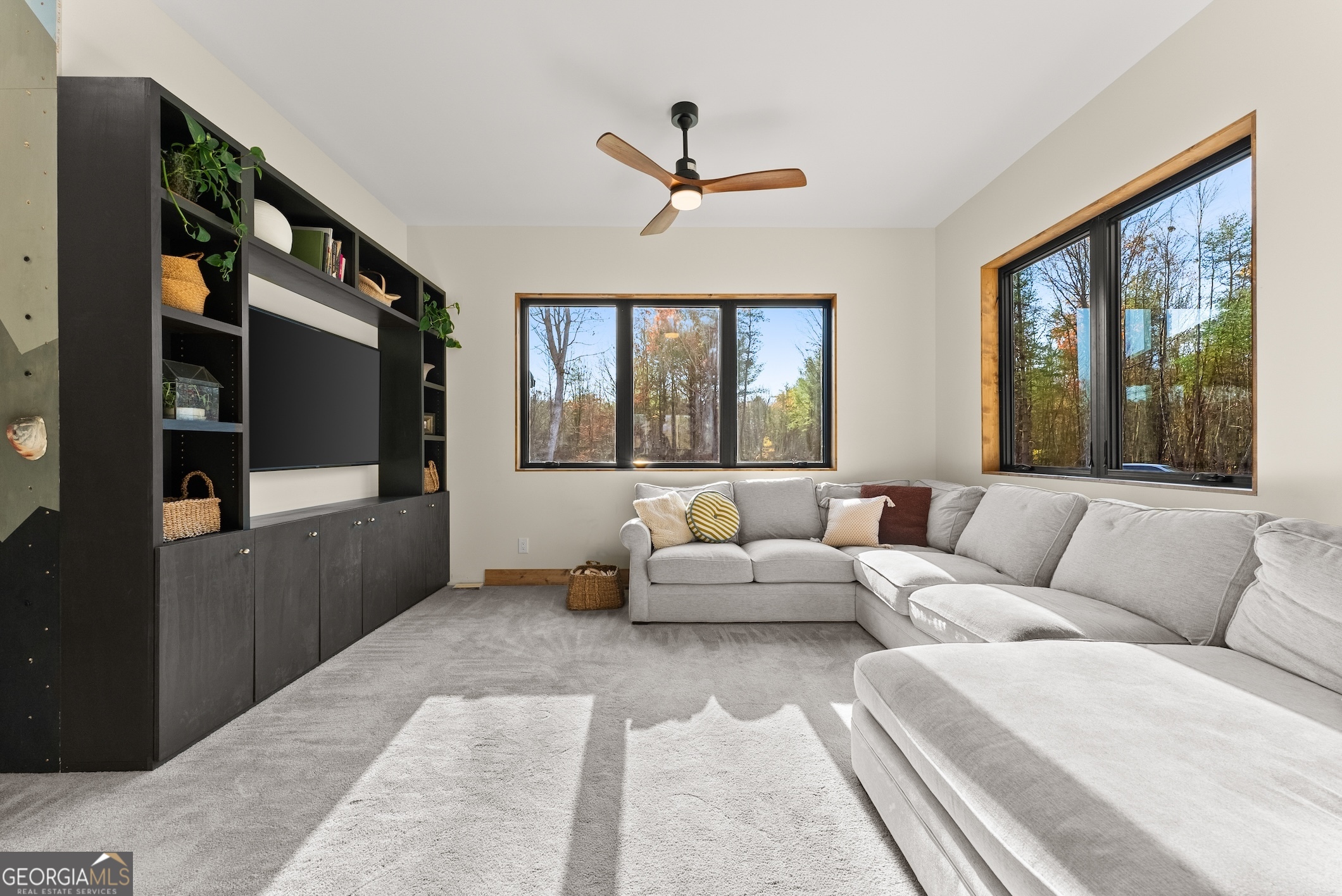 147 Jess Hunt W 60 Acres Road Cleveland, GA 30528 - Photo 23 of 69 a living room with furniture and large windows