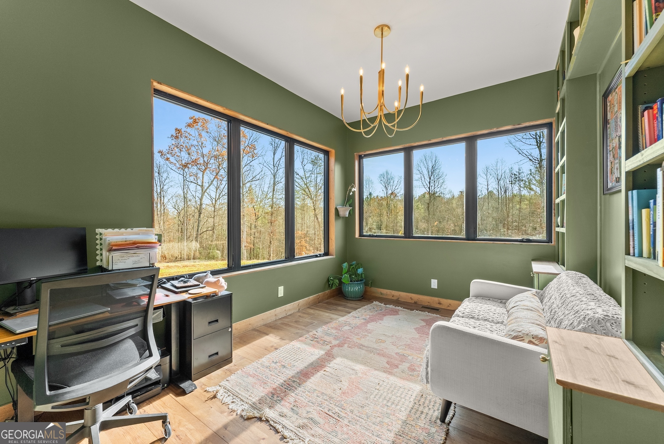 147 Jess Hunt W 60 Acres Road Cleveland, GA 30528 - Photo 25 of 69 a living room with furniture and a chandelier