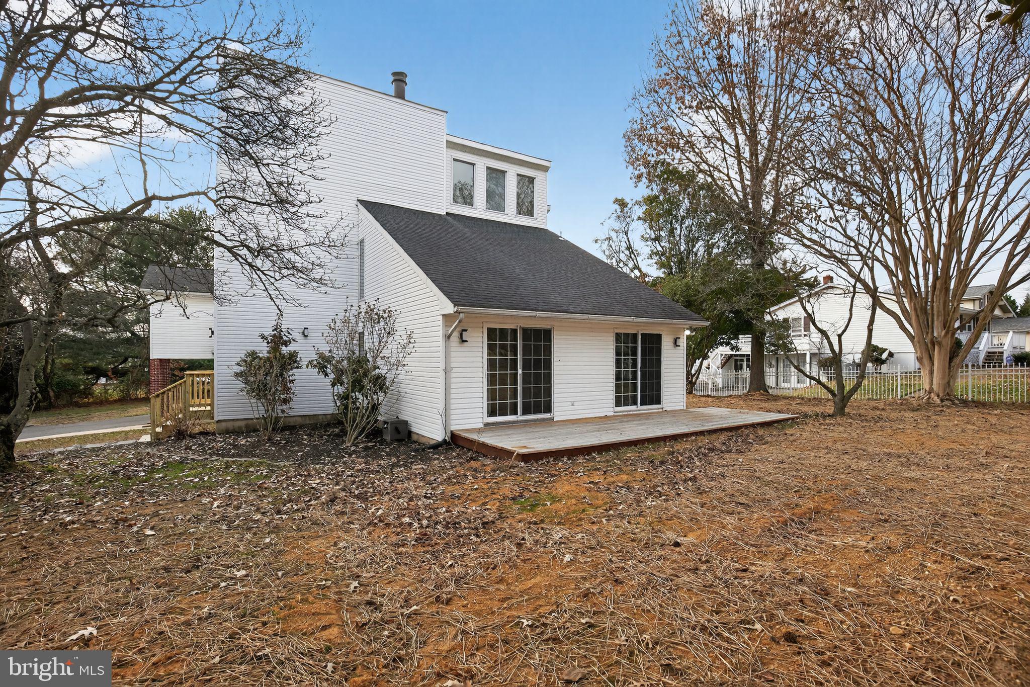 40855 Spring House Lane Leonardtown, MD 20650 - Photo 1 of 68 a front view of a house with a yard