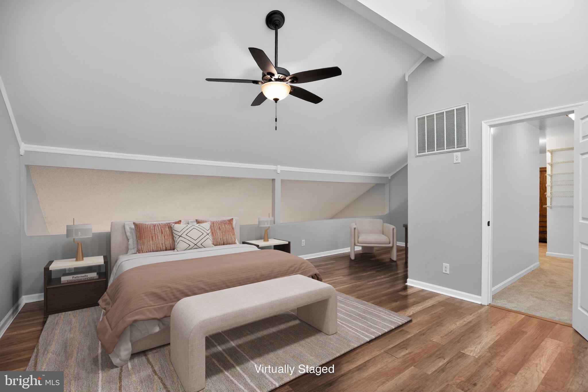 40855 Spring House Lane Leonardtown, MD 20650 - Photo 21 of 68 a bedroom with a bed and a ceiling fan