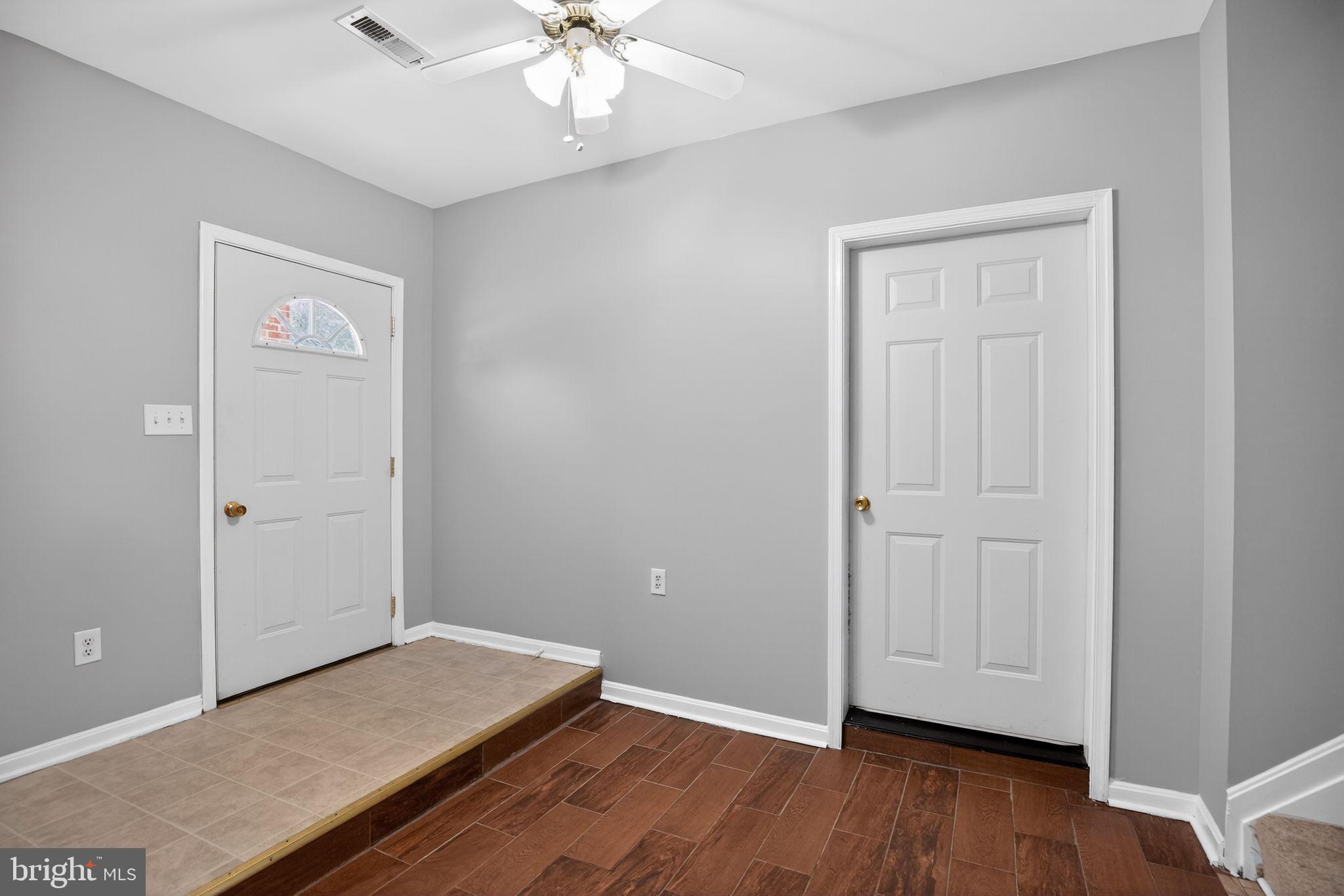 40855 Spring House Lane Leonardtown, MD 20650 - Photo 38 of 68 an empty room with wooden floor closet and windows