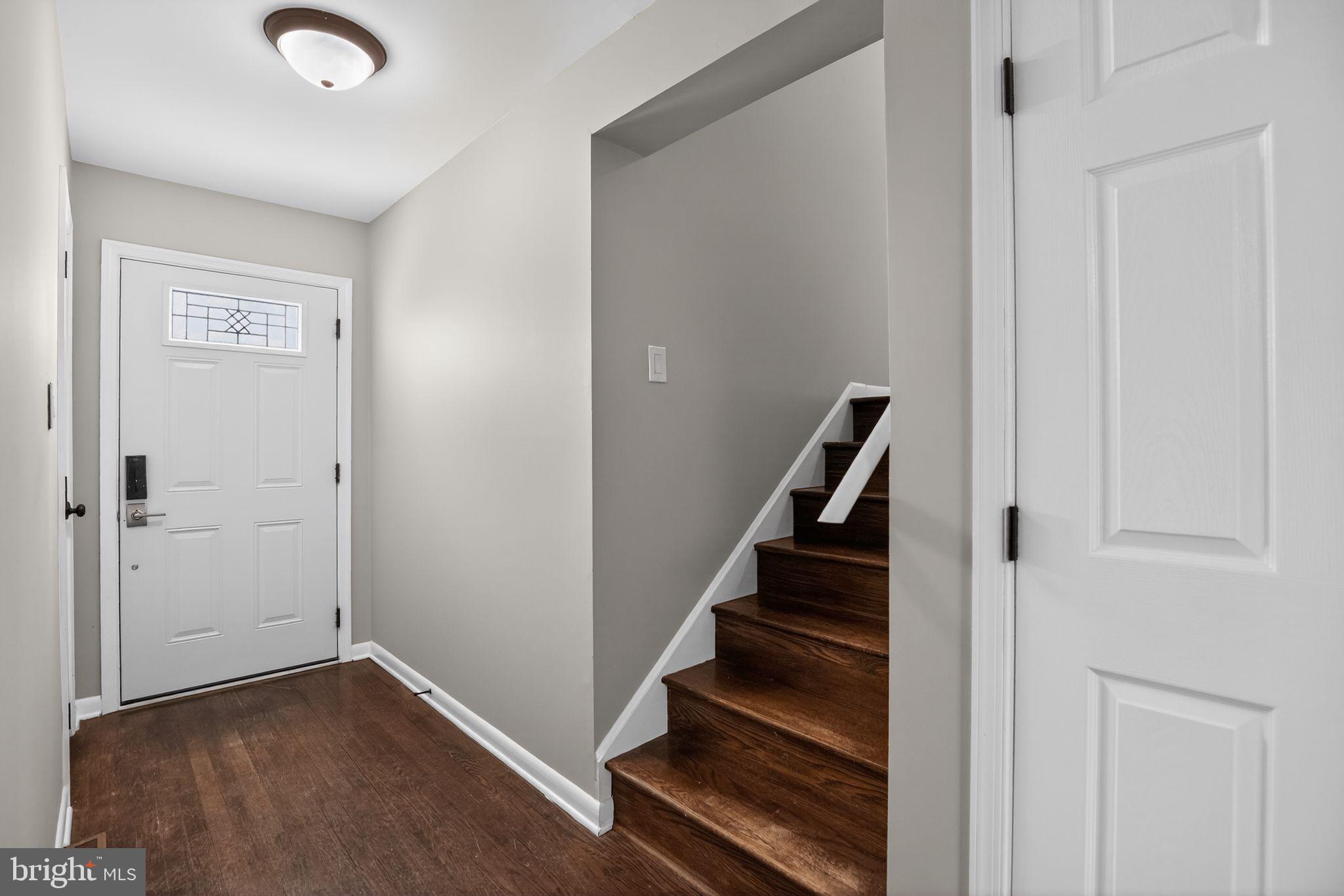 40855 Spring House Lane Leonardtown, MD 20650 - Photo 4 of 68 a view of an entryway with staircase