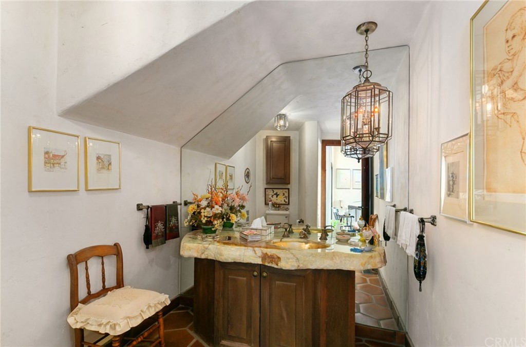 14081 Summit Drive Whittier, CA 90602 - Photo 31 of 61 a bathroom with a sink and a mirror