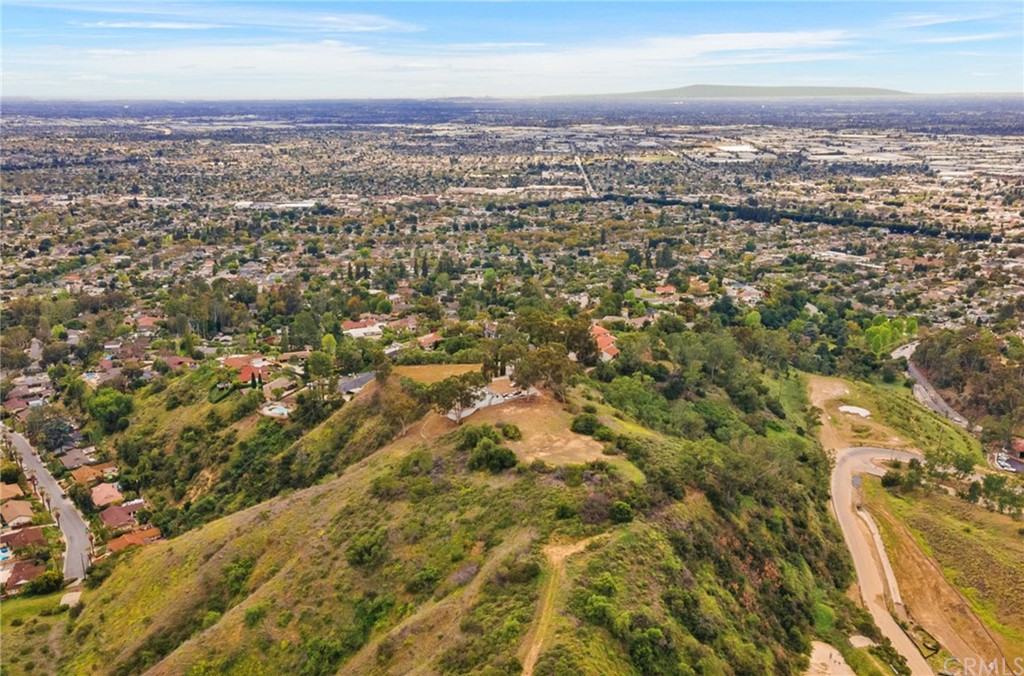 14081 Summit Drive Whittier, CA 90602 - Photo 56 of 61 an aerial view of residential building with parking space