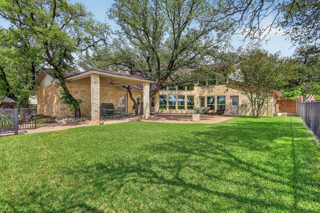 8877 Random Road Fort Worth, TX 76179 - Photo 28 of 40 a view of a house with backyard and garden