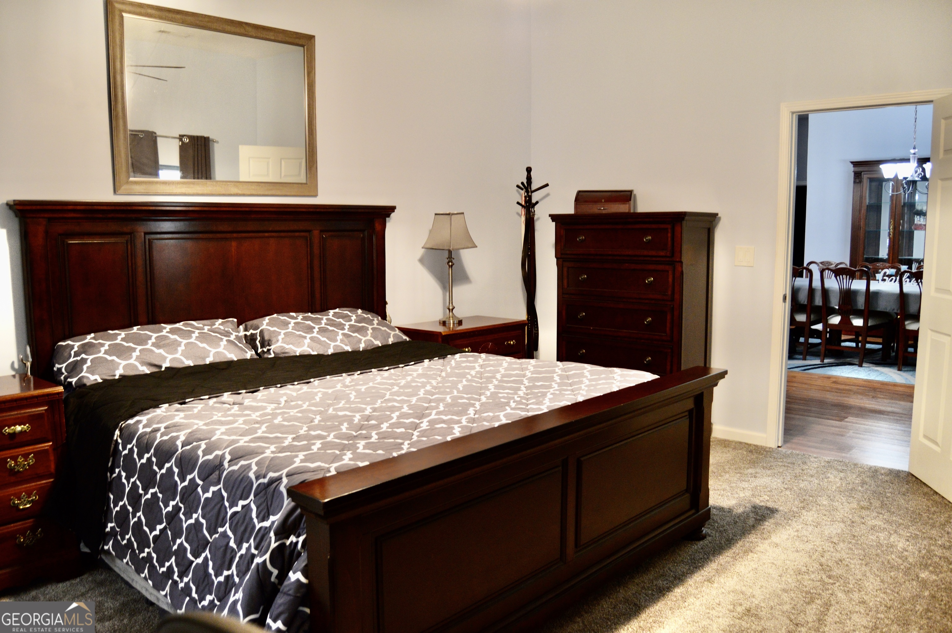 817 Brookside Drive Winder, GA 30680 - Photo 21 of 73 a bedroom with a bed and dresser
