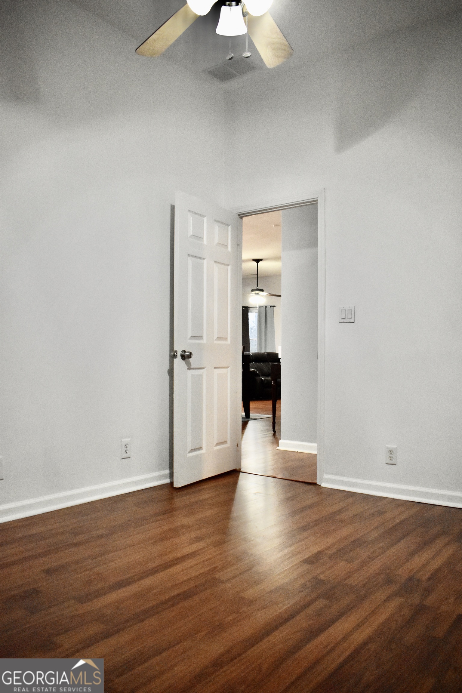 817 Brookside Drive Winder, GA 30680 - Photo 28 of 73 a view of empty room with wooden floor