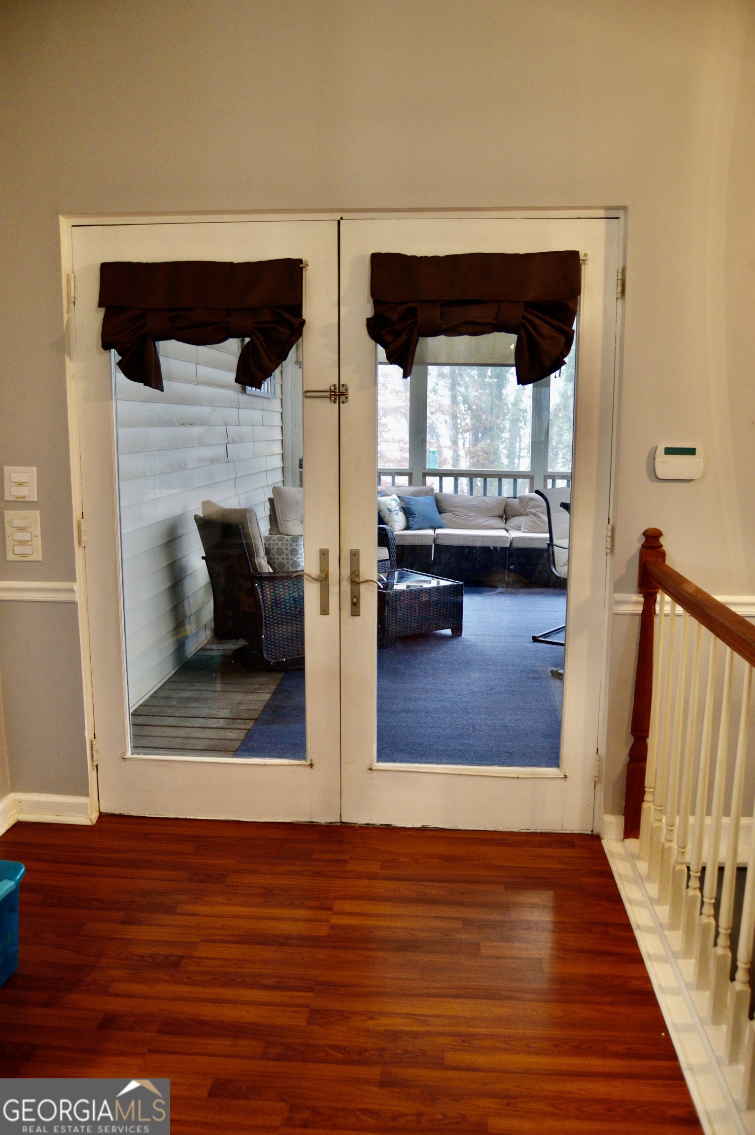 817 Brookside Drive Winder, GA 30680 - Photo 37 of 73 a living room with furniture and a wooden floor