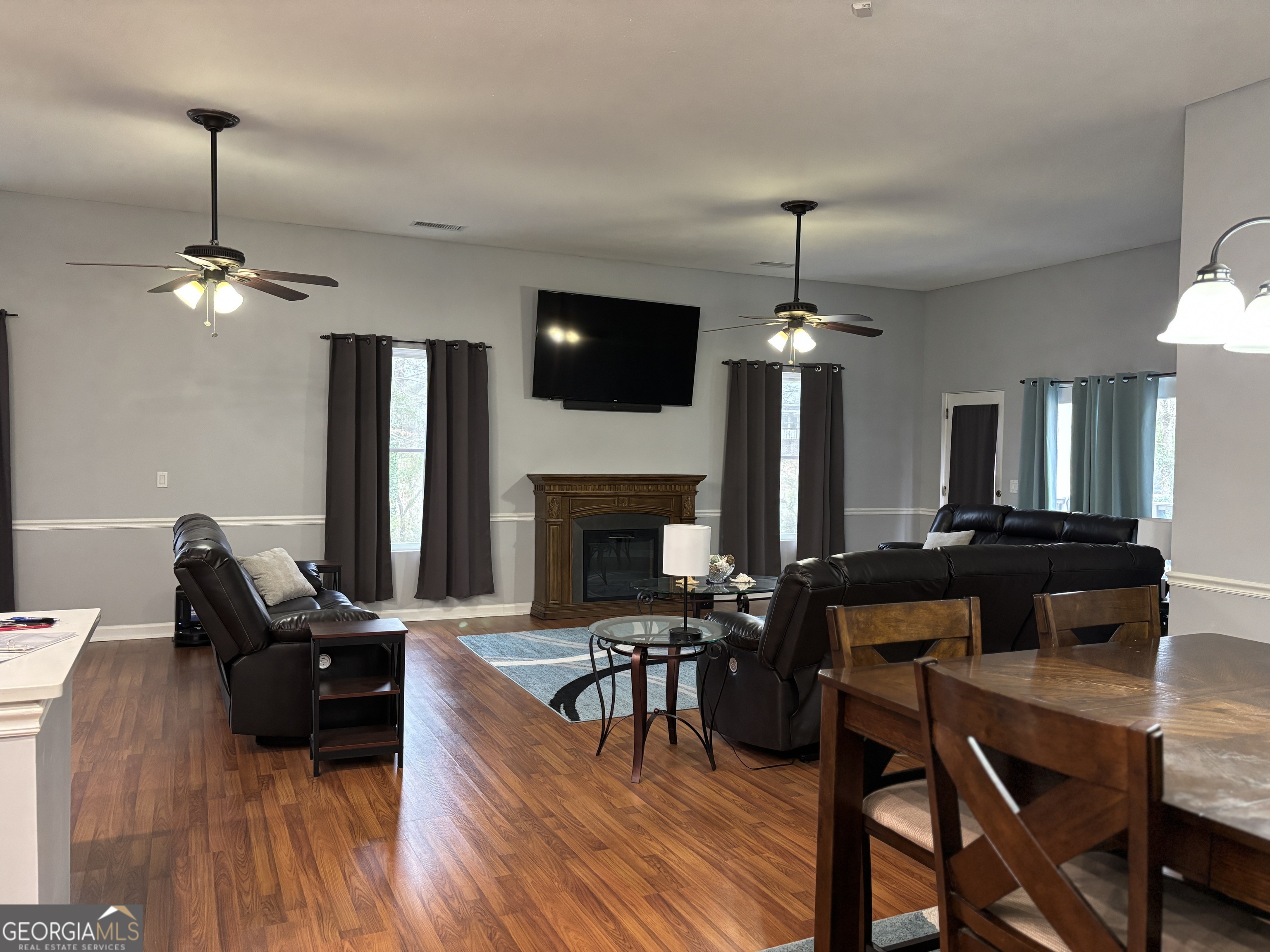817 Brookside Drive Winder, GA 30680 - Photo 4 of 73 a living room with furniture and a fireplace
