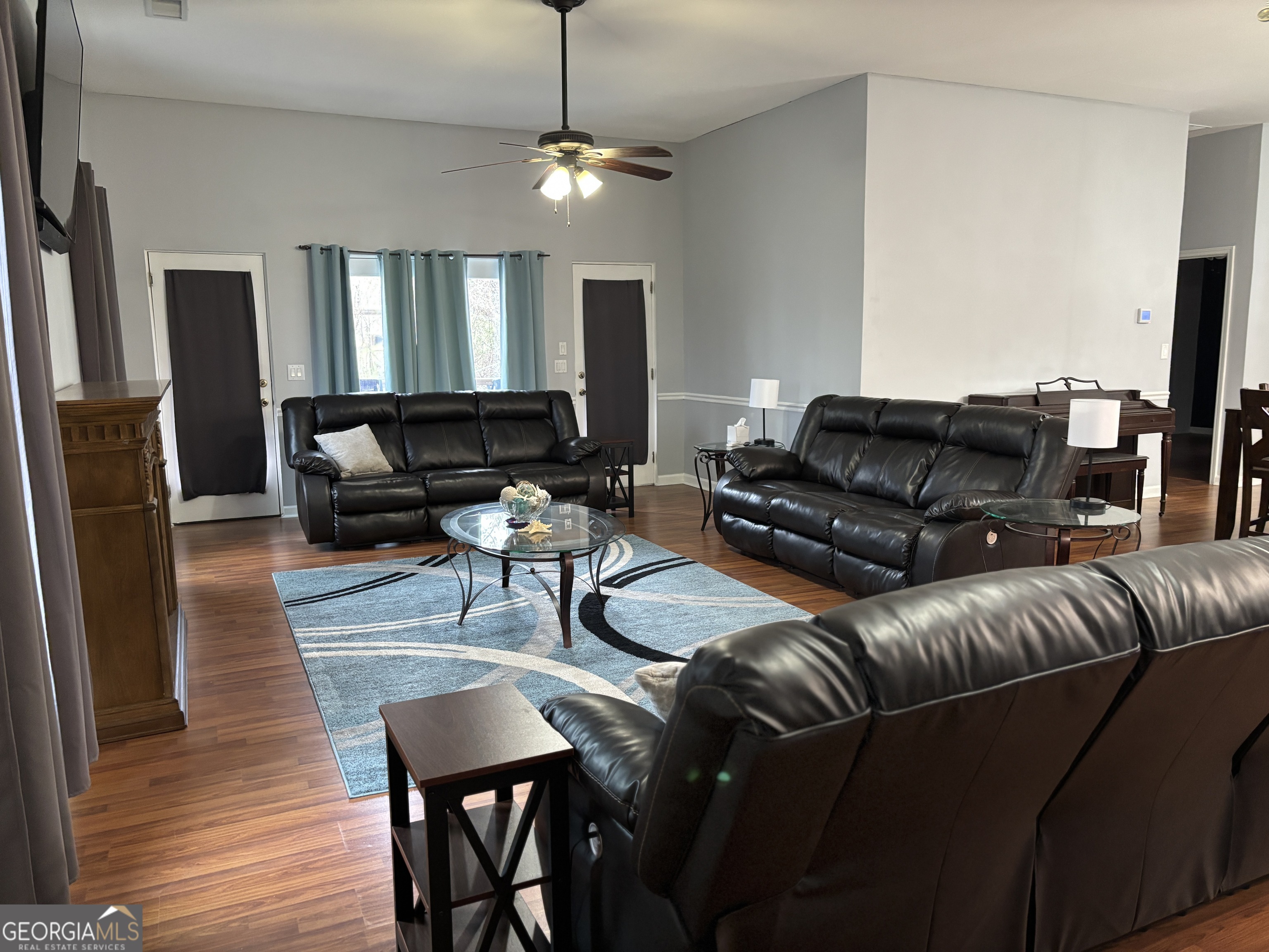 817 Brookside Drive Winder, GA 30680 - Photo 5 of 73 a living room with furniture and a wooden floor