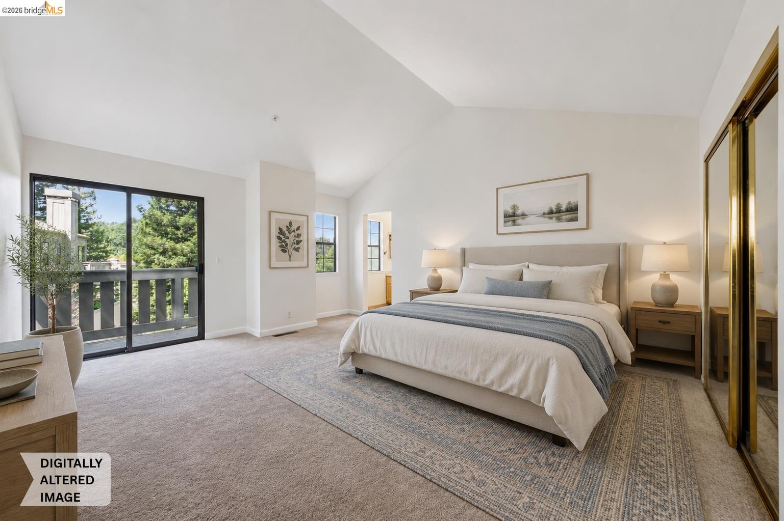 261 Redhawk Road Novato, CA 94949 - Photo 31 of 47 Spacious bedroom featuring vaulted ceilings, a large sliding glass door with balcony access, an additional window, and mirrored sliding closet doors