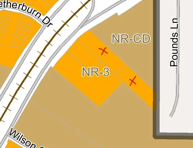 a blue sign that is on the side of a building