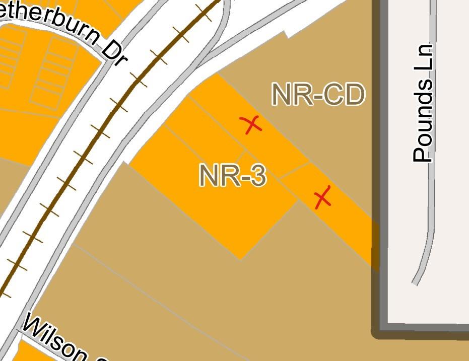 a blue sign that is on the side of a building