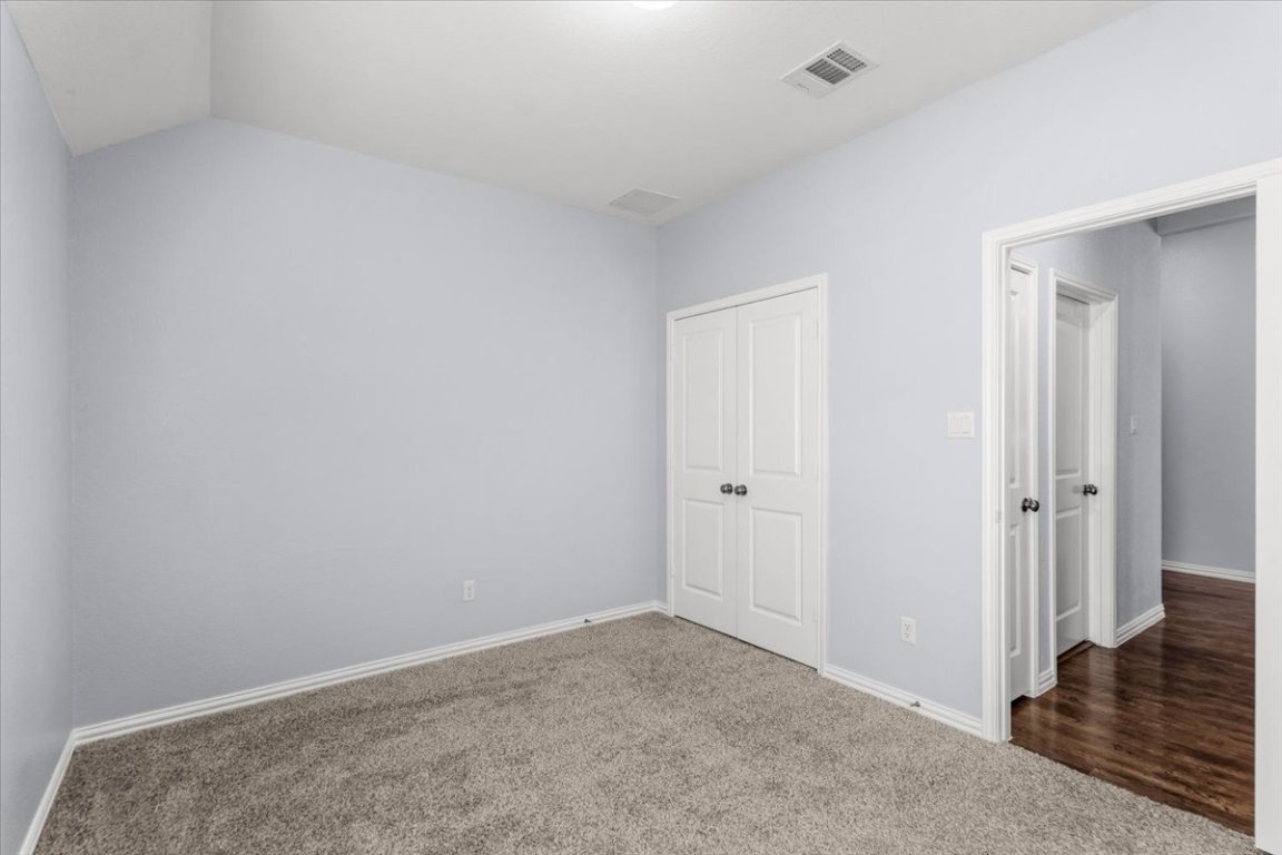 1440 Morning View Road Georgetown, TX 78628 - Photo 13 of 22 a view of hallway with wooden floor