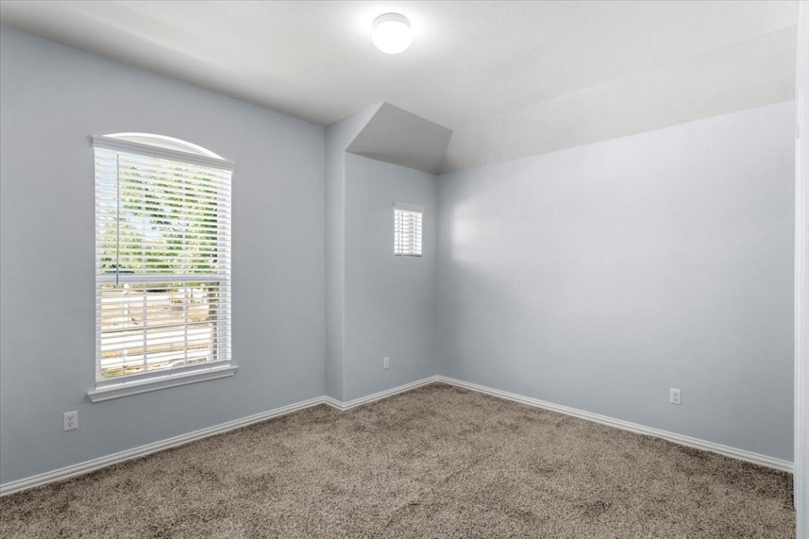 1440 Morning View Road Georgetown, TX 78628 - Photo 9 of 22 an empty room with a window
