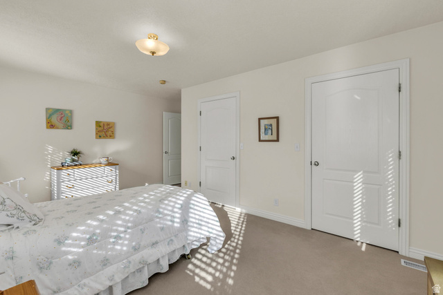 1060 West 2620th Street South Mapleton, UT 84664 - Photo 43 of 87 Bedroom featuring baseboards and light colored carpet