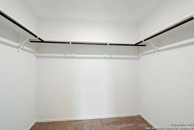 10707 Margarita Loop Converse, TX 78109 - Photo 15 of 32 Walk in closet with carpet floors