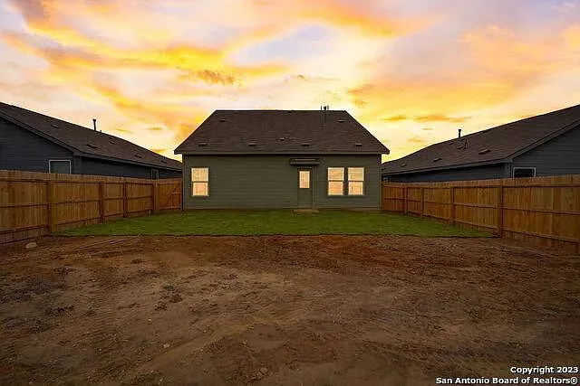 a house view with a backyard