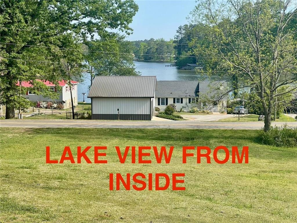 127 Mabry Road Jackson, GA 30233 - Photo 2 of 13 a street sign on the side of a road