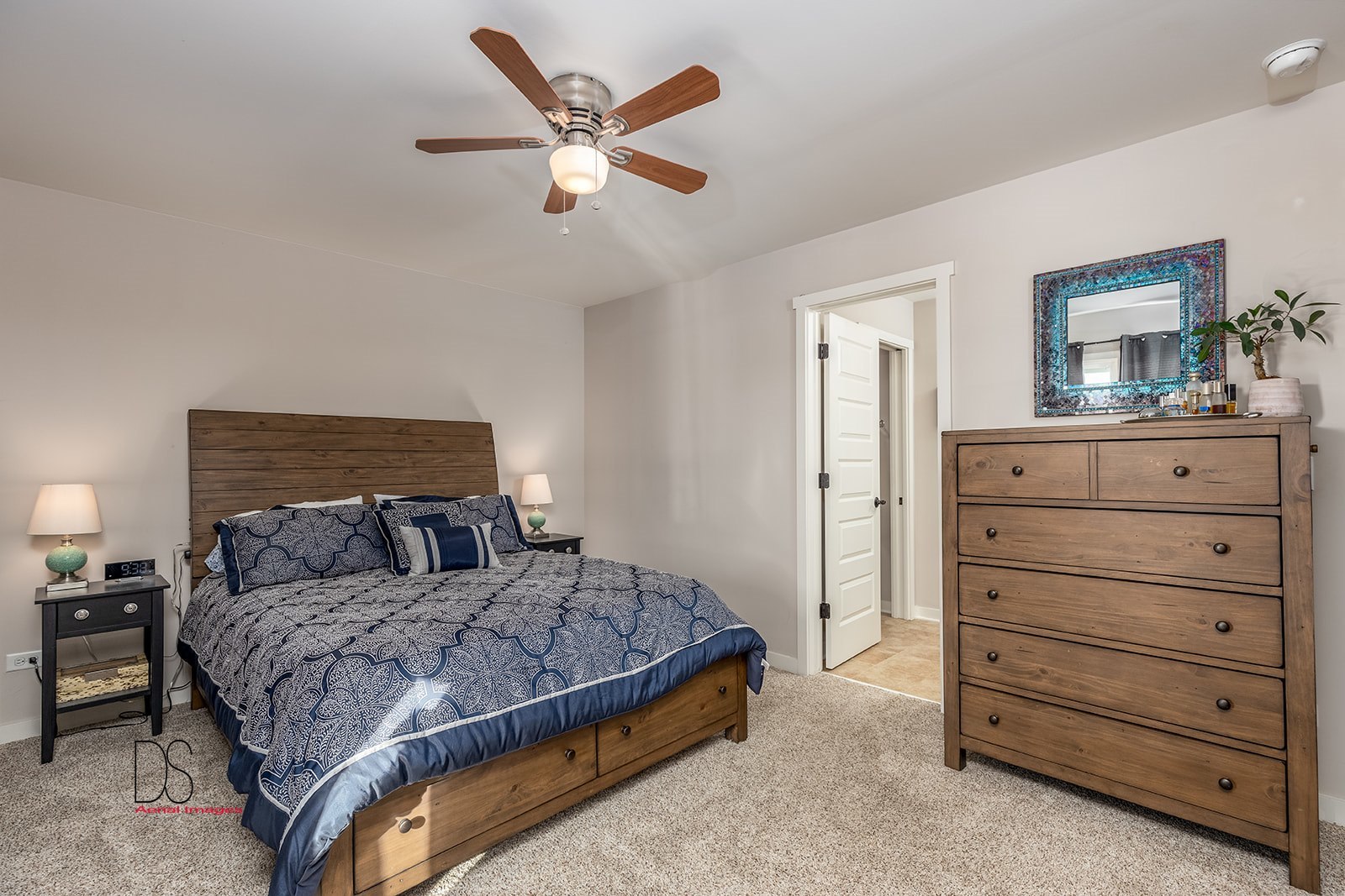5 River Row Ottawa, IL 61350 - Photo 15 of 31 a bedroom with a bed and a dresser