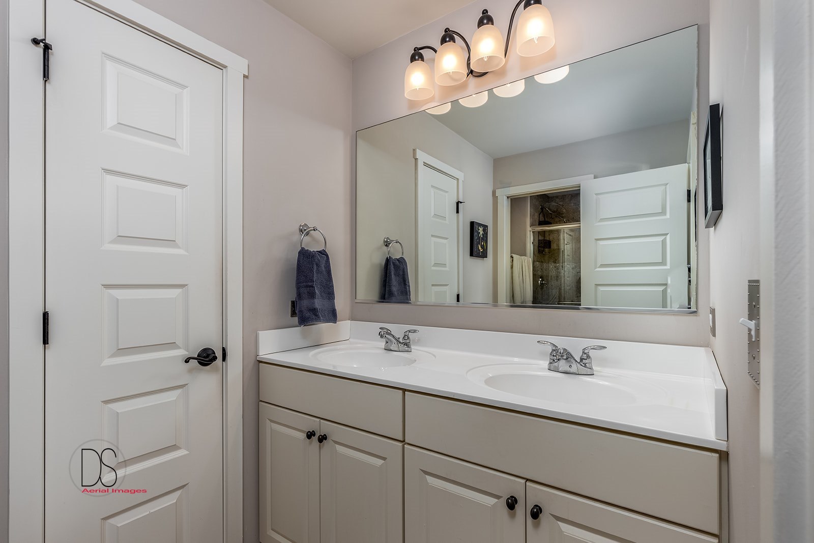 5 River Row Ottawa, IL 61350 - Photo 17 of 31 a bathroom with a sink a vanity and a mirror