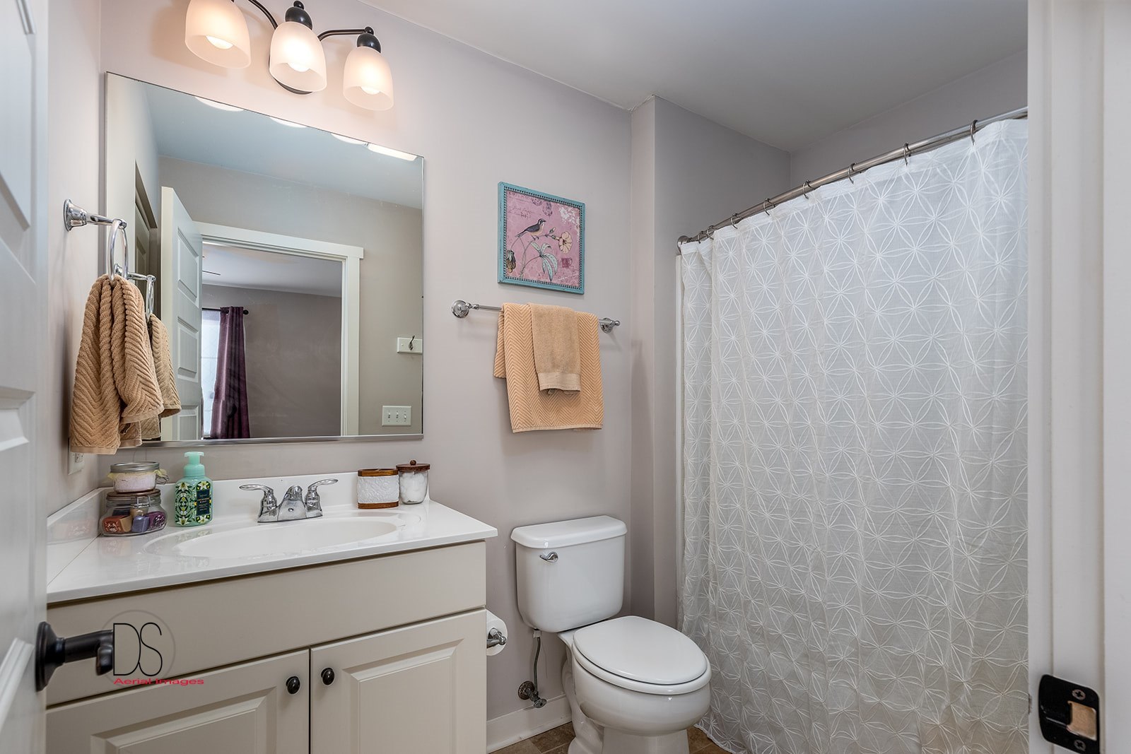 5 River Row Ottawa, IL 61350 - Photo 24 of 31 a bathroom with a sink vanity mirror and toilet