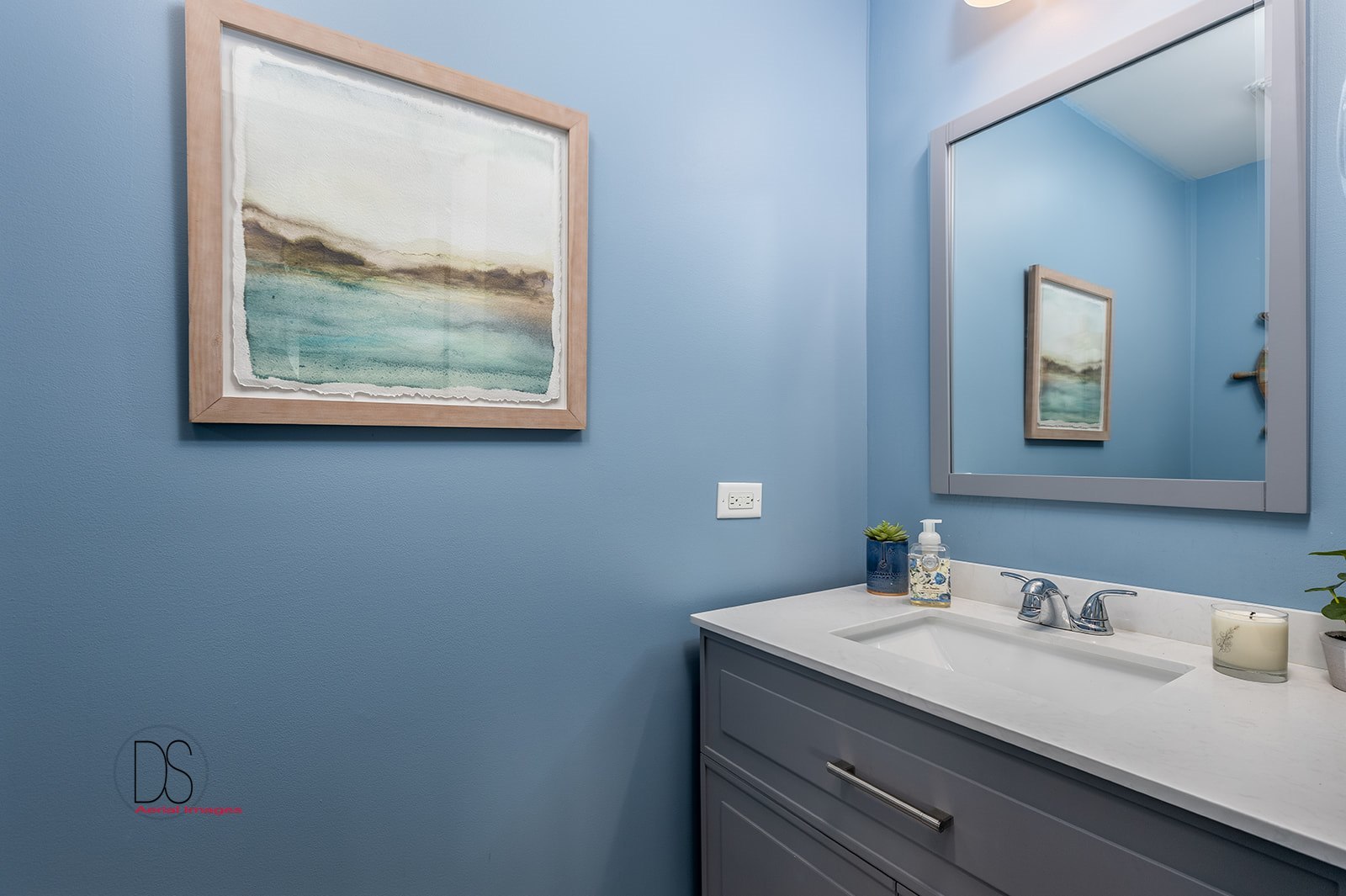 5 River Row Ottawa, IL 61350 - Photo 7 of 31 a bathroom with a granite countertop sink a mirror and a picture on the wall