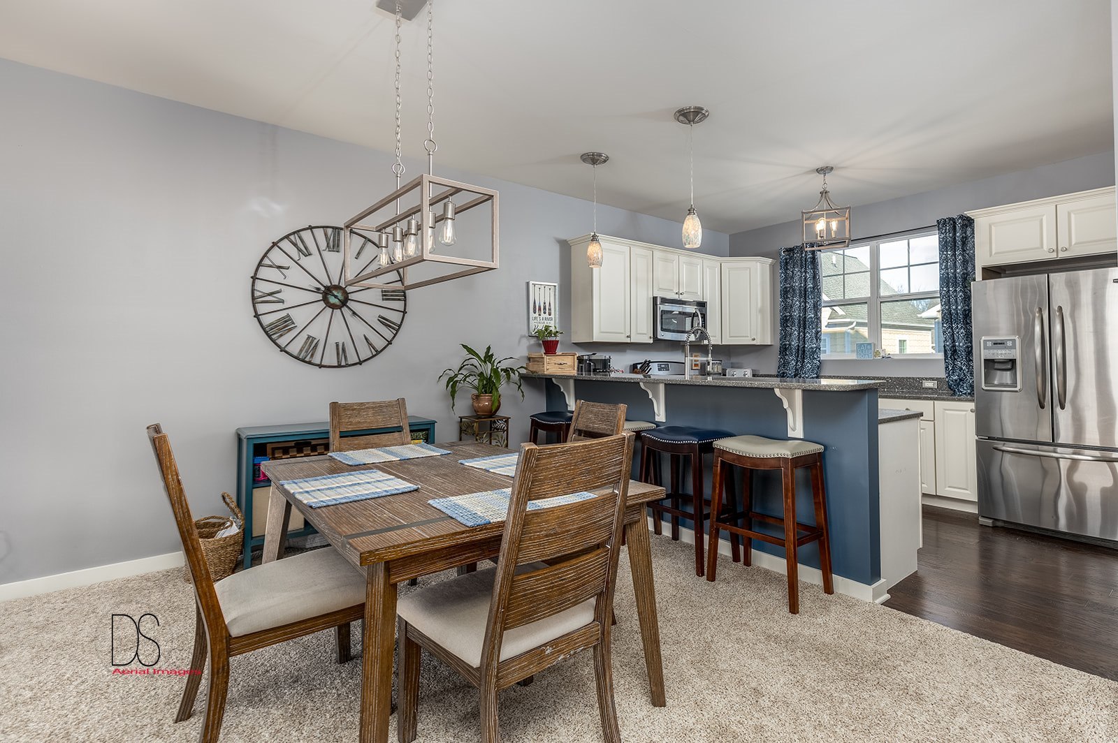 5 River Row Ottawa, IL 61350 - Photo 10 of 31 a view of a dining room with furniture wooden floor and a chandelier