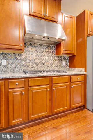 a view of balcony with wooden floor