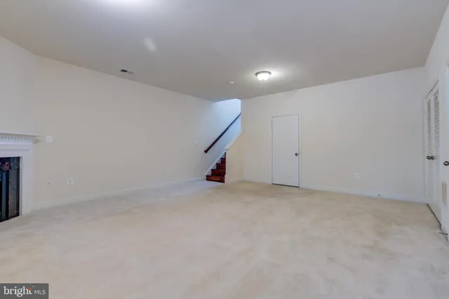 a view of a backyard with fence