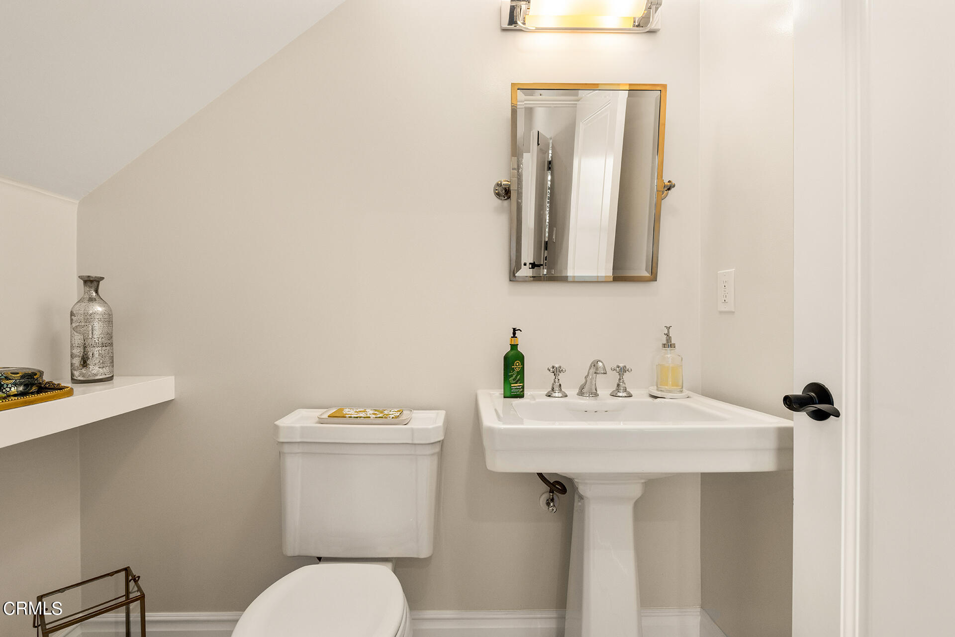 700 Union Street, Unit 209 Pasadena, CA 91101 - Photo 16 of 29 a bathroom with a sink mirror and toilet