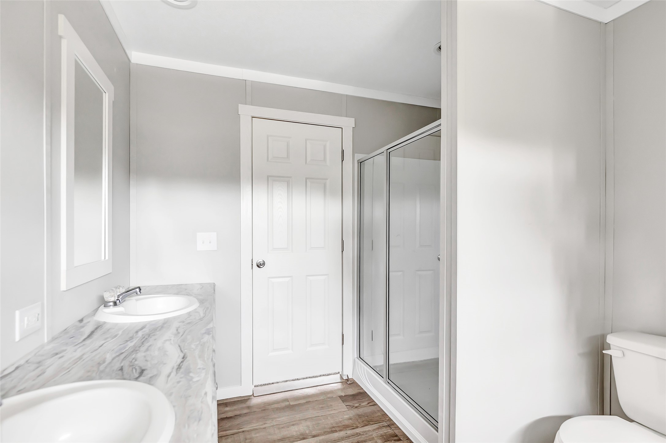 732 Lake Camelot Circle Ivanhoe, TX 75979 - Photo 11 of 18 a bathroom with a granite countertop sink toilet and shower